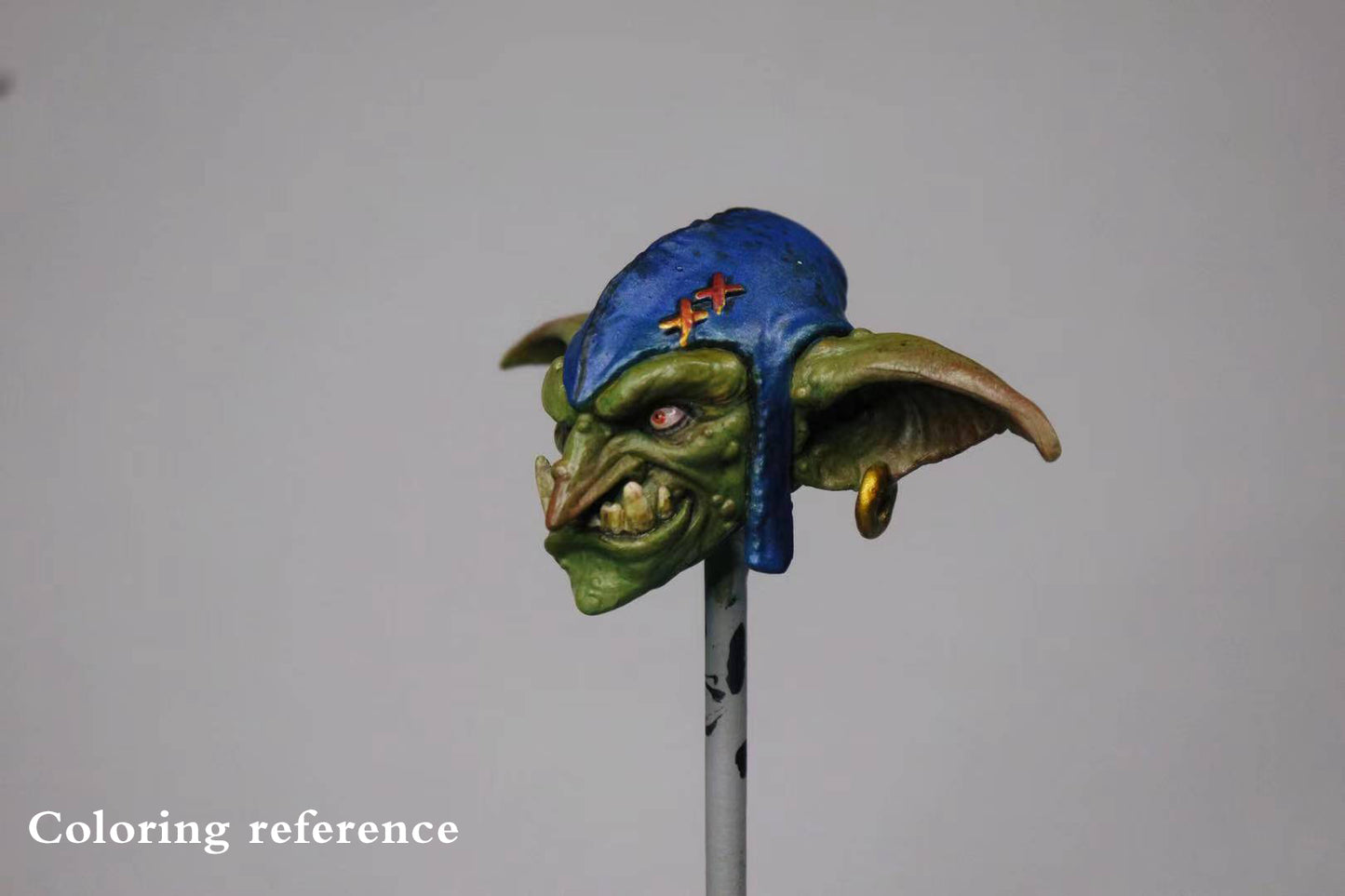 Head Carving - Blue hat with one eye
