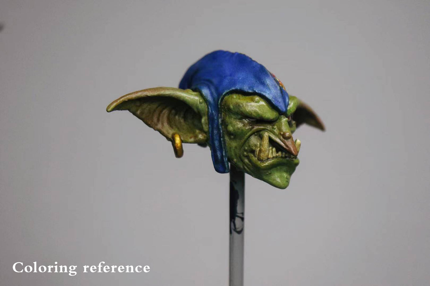 Head Carving - Blue hat with one eye
